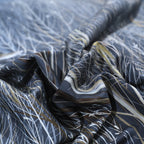 Close-up of forest print and cotton texture – LINKORI Dark Forest duvet with tree design