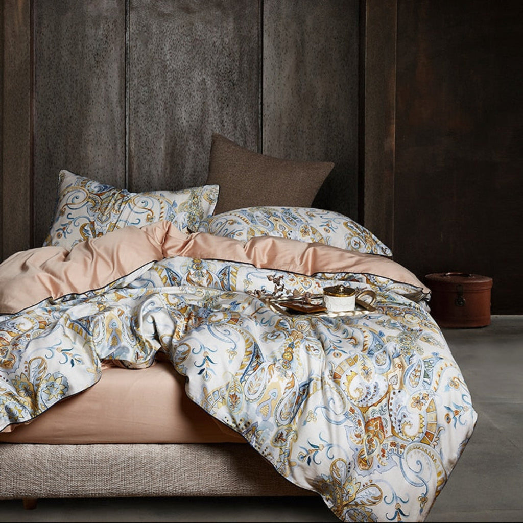 Full view of LINKORI Sinamoning paisley floral bedding set styled in an autumn-inspired bedroom, featuring beige tones and botanical motifs on silky Egyptian cotton.