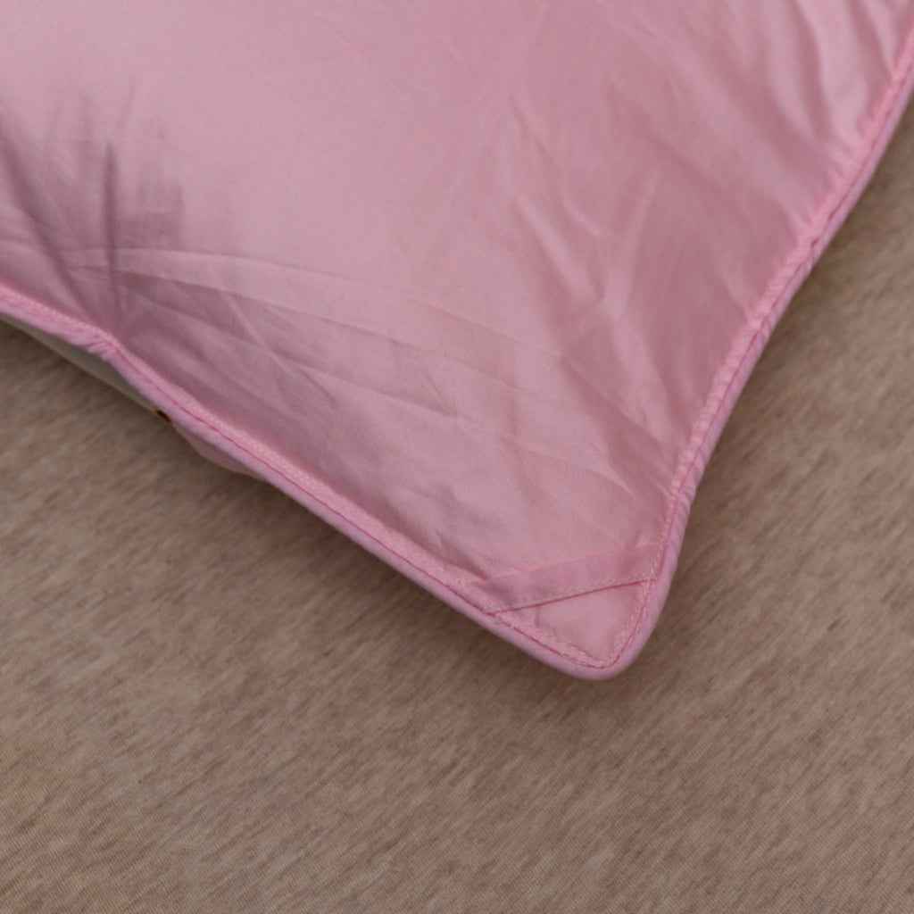 Seam and corner finish – minimal yet structured tailoring in soft pink cotton