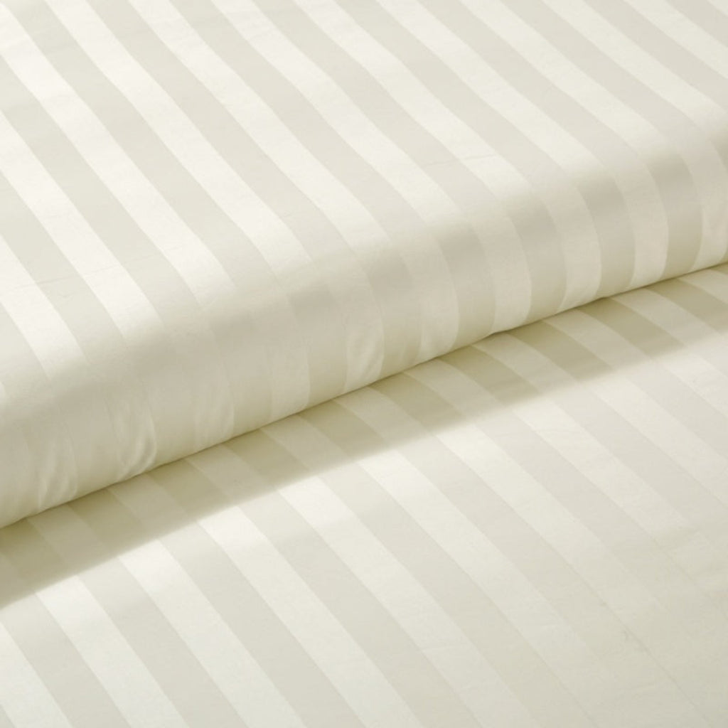 Macro view of the soft stripe pattern on the duvet cover, illustrating its subtle design and gentle sheen.