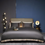 deep grey satin-finish Egyptian cotton duvet cover set with cream-gold trim and matching flat sheet 4-piece luxury bedding in modern luxury bedroom | LINKORI Grey Satin full view