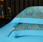 Turquoise flat sheet with two decorative pillows — 1000TC Egyptian cotton luxury bedding for art-deco, bohemian luxe, and coastal luxury bedrooms.