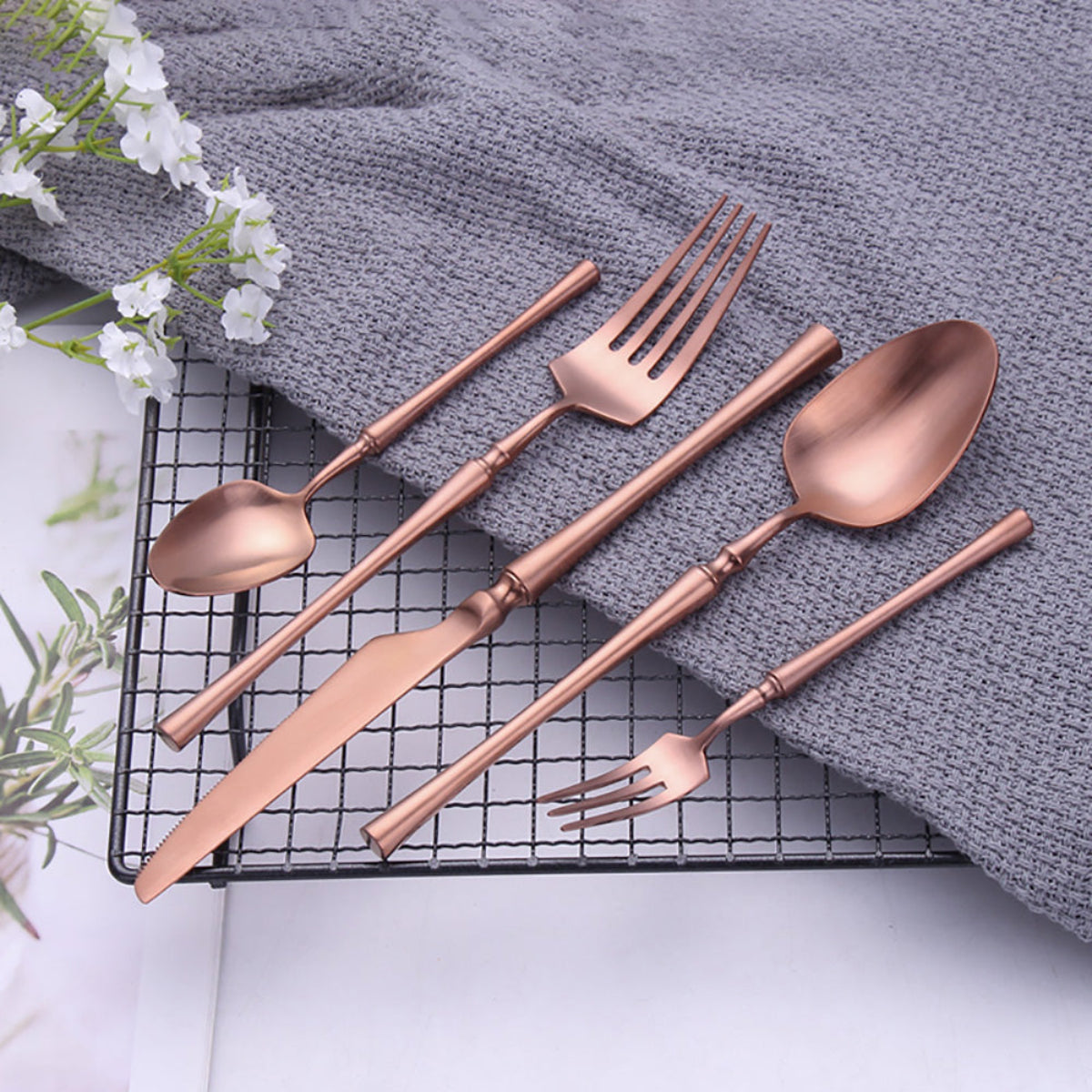 Modern rose gold cutlery set for everyday use — luxury matte finish flatware styled for contemporary tablescapes