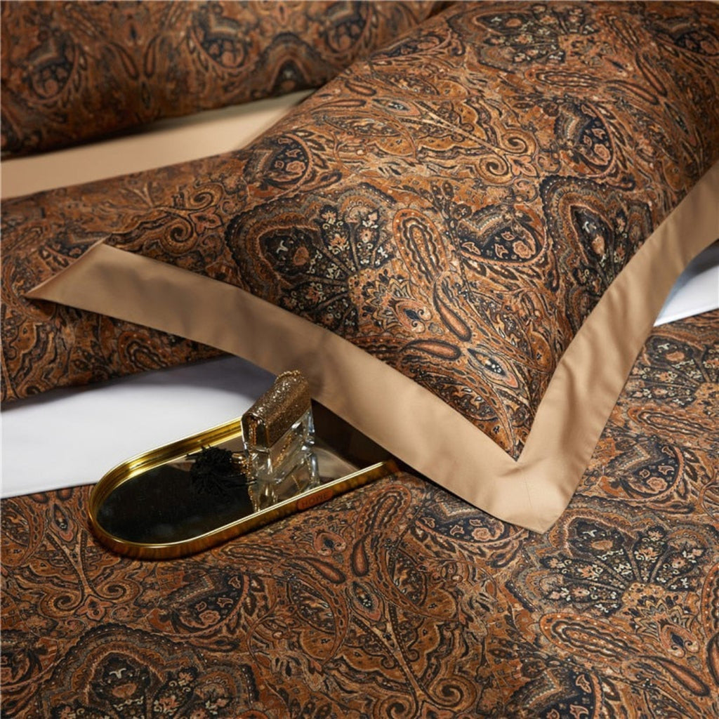 Detailed view of the brown paisley motif on Zuvric pillow cover — castlecore elegance with vintage textile charm in every thread.
