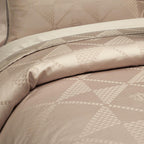 Close-up of 100% Egyptian cotton beige duvet and pillow set with minimalist jacquard pattern | LINKORI Glotia