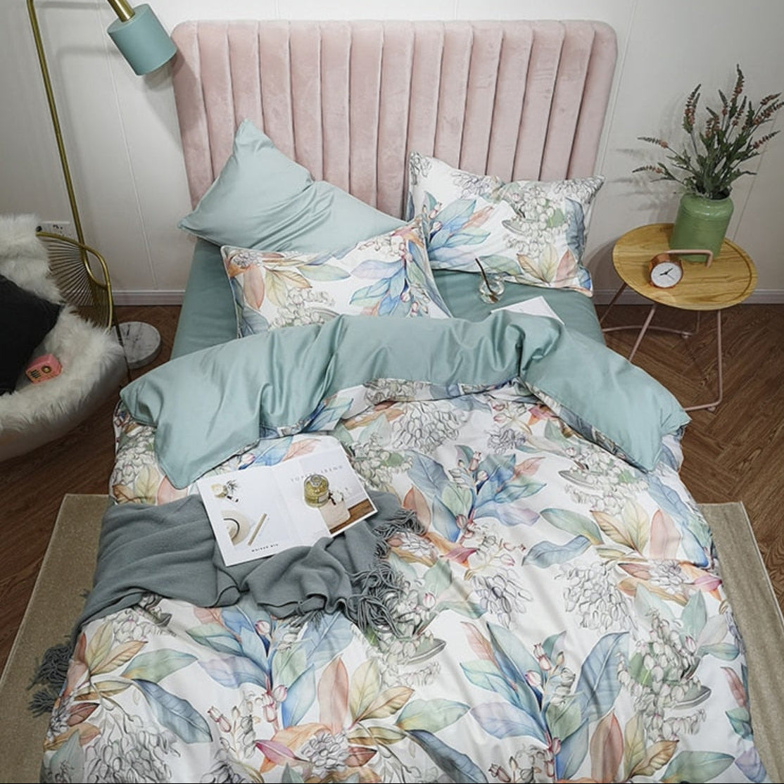 Mint green and floral duvet cover set styled in modern bedroom with velvet blush headboard – LINKORI Mintera