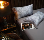 Classic bedroom styling with grey floral pillow set on soft grey flat sheet – minimalist quiet luxury design | LINKORI, pillow styling view