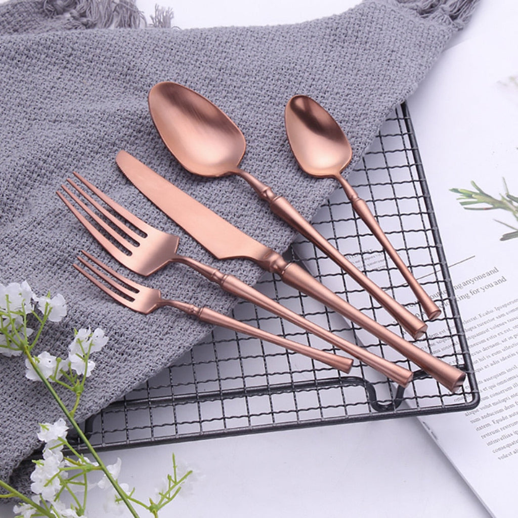 Matte rose gold cutlery handles in 304 stainless steel — chic flatware detail for minimalist and romantic dining decor