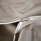 Detailed view of concealed zipper on champagne Egyptian cotton duvet cover — seamless and functional closure.